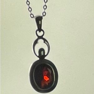 Ruby red necklace with matching earrings, set in 925 silver